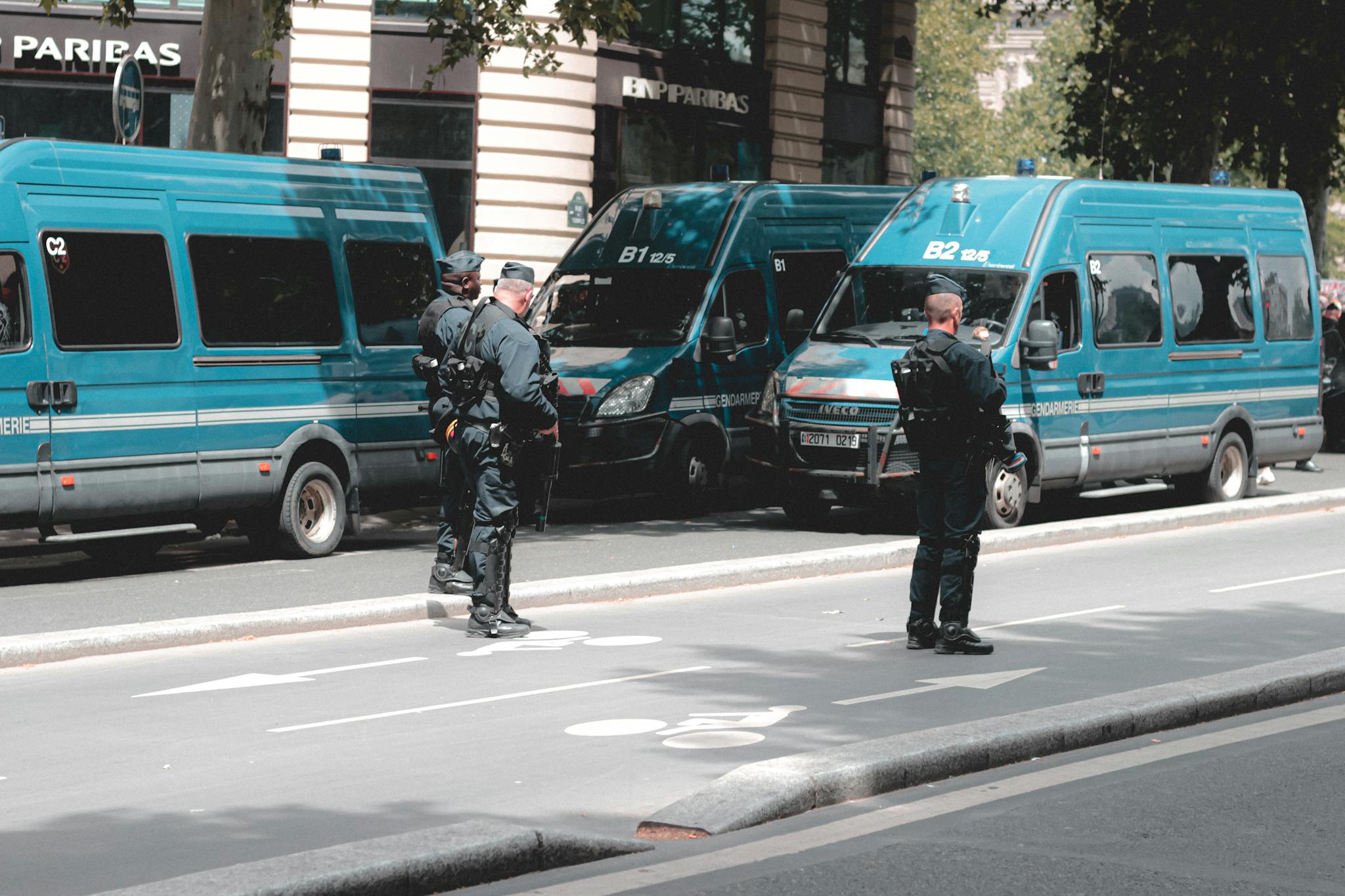 Armed police squad controlling street